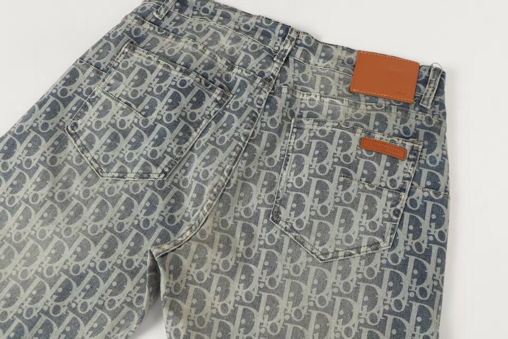 Oblique All-Over Print Faded Denim Jeans | Blue