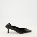 Worn Leather Pumps
