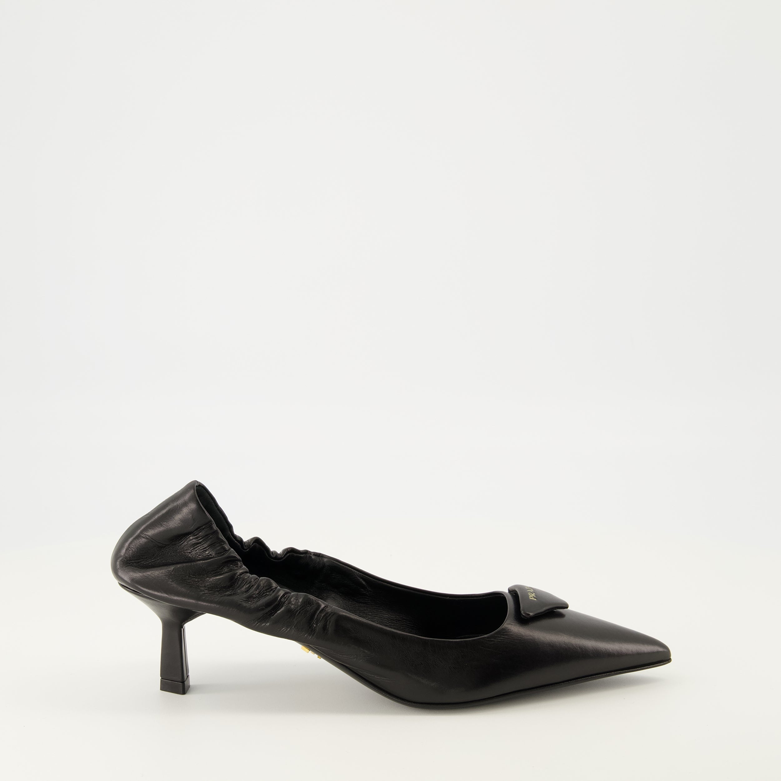 Worn Leather Pumps