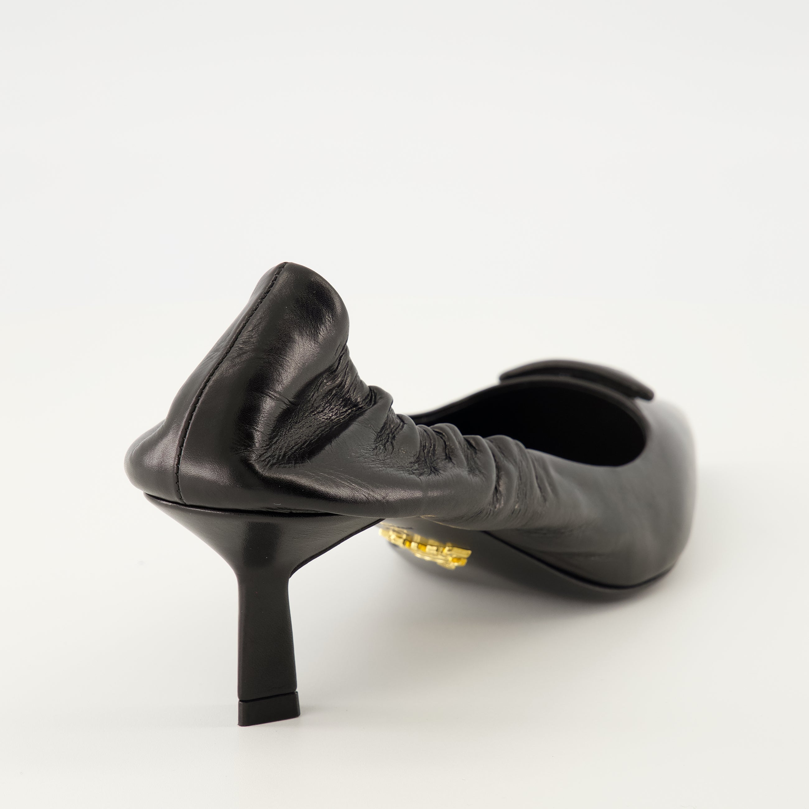 Worn Leather Pumps
